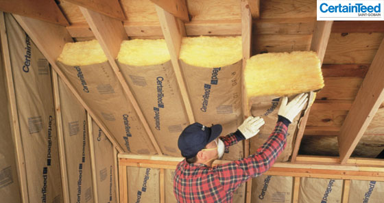 What is Insulation? - Man insulating walls and ceilings